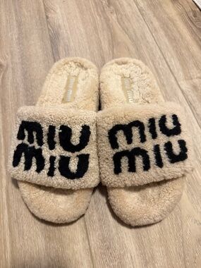 Miu Miu Beige and Black Shearling Logo Slides